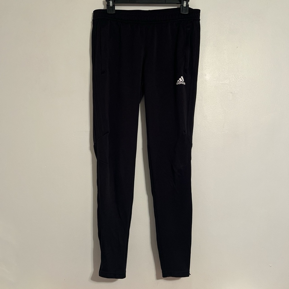Black Adidas track pants